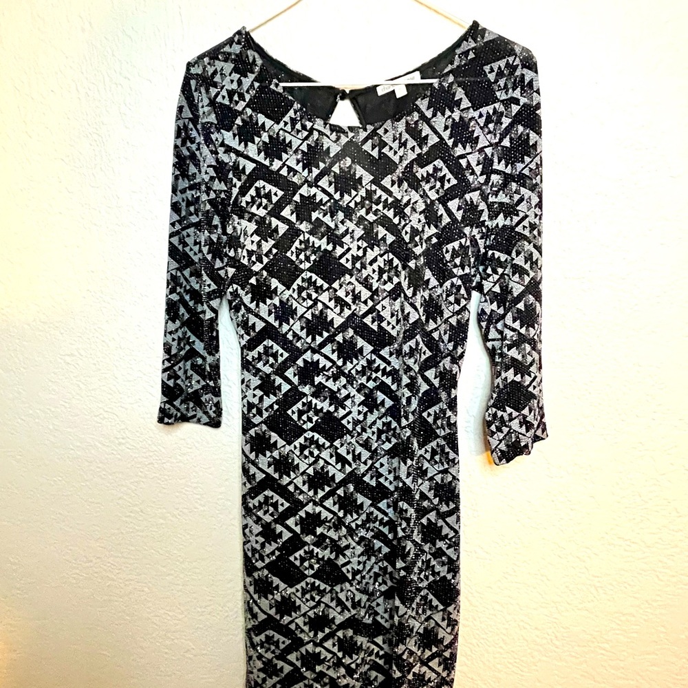 Calf length shiny open back dress